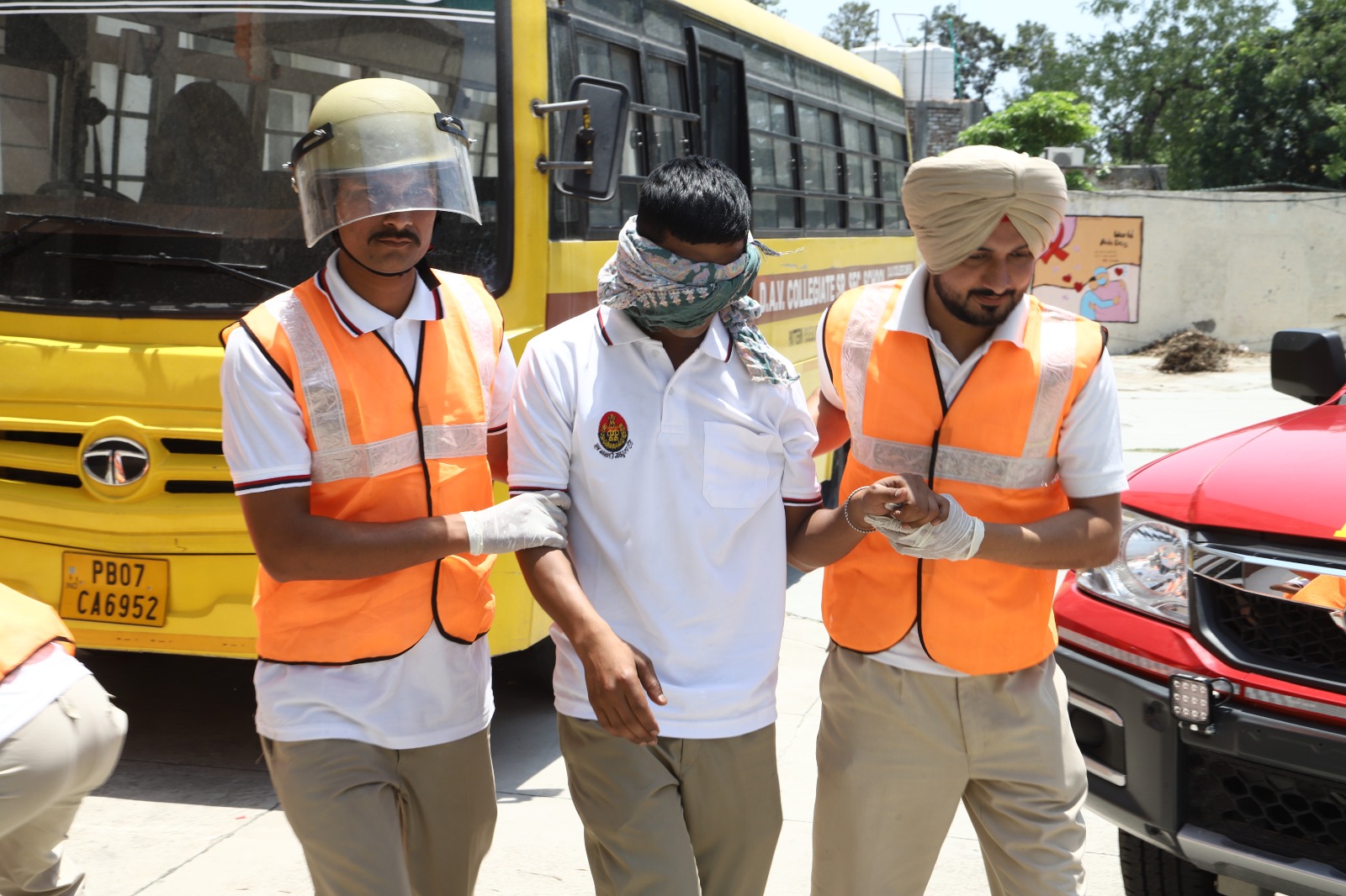 Demonstration of emergency strategy in case of possible air attack during mock drill.